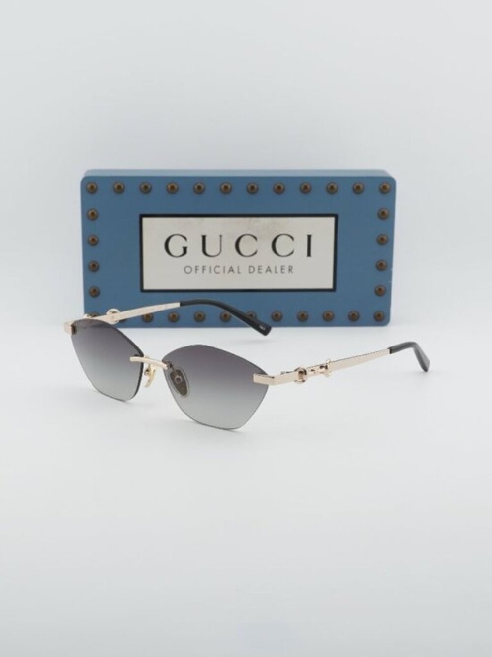 Gucci GG2050S 002 Rimless Cat Eye Sunglasses - Gold / Grey
